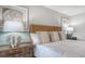 Bright bedroom featuring neutral decor, carpet, and modern furnishings at 210 Bilge Rd, Ridgeville, SC 29472