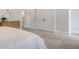 Bedroom featuring carpet, double closets, and neutral decor at 210 Bilge Rd, Ridgeville, SC 29472