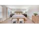 Serene bedroom with neutral tones, soft carpeting, and well-placed bedside lighting at 210 Bilge Rd, Ridgeville, SC 29472