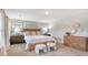 Bedroom featuring neutral decor, carpet, and modern furnishings at 210 Bilge Rd, Ridgeville, SC 29472