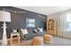 Stylish bonus room with chalkboard wall, modern furniture, and unique decor creating a fun space at 210 Bilge Rd, Ridgeville, SC 29472