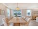 Charming dining room with views, a wooden table and seating for six at 210 Bilge Rd, Ridgeville, SC 29472