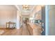 Bright entryway featuring beautiful hardwood floors, elegant lighting, and decorative accents at 210 Bilge Rd, Ridgeville, SC 29472