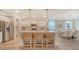 Modern kitchen with stainless steel appliances, island seating, and ample counter space at 210 Bilge Rd, Ridgeville, SC 29472