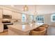 Bright kitchen with stainless appliances, large island, pendant lights, and breakfast bar at 210 Bilge Rd, Ridgeville, SC 29472