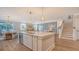 Open kitchen with a large island, modern appliances, and seamless flow to the living areas at 210 Bilge Rd, Ridgeville, SC 29472