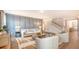 Beautiful living room with wainscoting wall, modern furniture, and hardwood floors at 210 Bilge Rd, Ridgeville, SC 29472