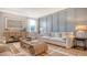 Bright living room with stylish furniture, neutral decor, and bright windows at 210 Bilge Rd, Ridgeville, SC 29472