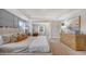 The main bedroom boasts a spacious sitting area, soft natural light, and an artful design at 210 Bilge Rd, Ridgeville, SC 29472