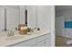 Bathroom featuring double sinks, white cabinets, and modern fixtures at 212 Bilge Rd, Ridgeville, SC 29472
