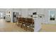 Kitchen features modern appliances, stone countertops, central island with seating and is open concept at 212 Bilge Rd, Ridgeville, SC 29472