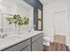 Modern bathroom featuring double sinks, sleek countertops, and a clean, contemporary design at 213 West Bradford Pointe Dr, Summerville, SC 29486