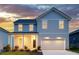 Charming two-story home featuring a well-maintained lawn and a spacious two-car garage at 213 West Bradford Pointe Dr, Summerville, SC 29486