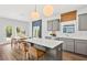 Modern kitchen featuring sleek countertops, stainless steel appliances, and an island with seating at 213 West Bradford Pointe Dr, Summerville, SC 29486