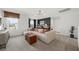 A bright living room with modern sectional, ottoman, and decor at 213 West Bradford Pointe Dr, Summerville, SC 29486