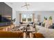Comfortable living room with stylish furnishings and natural light, perfect for relaxation and entertaining at 213 West Bradford Pointe Dr, Summerville, SC 29486
