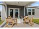 Cozy outdoor patio featuring stylish seating and a relaxing atmosphere for outdoor enjoyment at 213 West Bradford Pointe Dr, Summerville, SC 29486