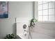 Bright bathroom featuring a tub with white tile surround, modern fixtures, and a window at 215 Center Hill Ct, Summerville, SC 29485