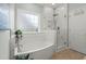 Luxurious bathroom featuring a soaking tub and separate glass-enclosed shower at 215 Center Hill Ct, Summerville, SC 29485