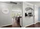 View of kitchen through archway from a living room with a clock on the wall at 215 Center Hill Ct, Summerville, SC 29485