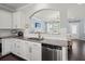 Bright, open kitchen with granite counters, and stainless steel dishwasher at 215 Center Hill Ct, Summerville, SC 29485