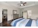 Spacious main bedroom with hardwood floors, walk-in closet, and ensuite bathroom access at 215 Center Hill Ct, Summerville, SC 29485