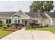 Charming home with well-manicured landscaping and inviting curb appeal at 2441 Hansard Dr, North Charleston, SC 29406