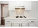 Well-maintained kitchen featuring sleek appliances, white cabinets, and modern hardware at 2441 Hansard Dr, North Charleston, SC 29406