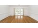 Bright living room with hardwood floors and double doors at 2441 Hansard Dr, North Charleston, SC 29406