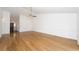 Open living room features hardwood floors, a ceiling fan, and neutral paint at 2441 Hansard Dr, North Charleston, SC 29406