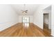 Large living room featuring hardwood flooring and door access to a patio at 2441 Hansard Dr, North Charleston, SC 29406