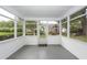 Enclosed sunroom with screened windows, view of backyard at 2441 Hansard Dr, North Charleston, SC 29406
