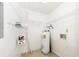 Utility room with water heater and shelving for storage at 2441 Hansard Dr, North Charleston, SC 29406