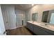Bathroom featuring double sinks, modern fixtures, and a glass enclosed shower at 256 Wild Strawberry Ln, Moncks Corner, SC 29461