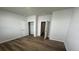 Bedroom view showing flooring, walk in closet and door to another room at 256 Wild Strawberry Ln, Moncks Corner, SC 29461
