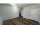 Bedroom with modern wood flooring and view of closet at 260 Wild Strawberry Ln, Moncks Corner, SC 29461