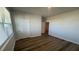 Bedroom showcasing wood floors and window with view at 260 Wild Strawberry Ln, Moncks Corner, SC 29461