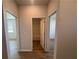 Hallway showing doorways to several rooms, displaying the open layout at 260 Wild Strawberry Ln, Moncks Corner, SC 29461
