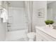 A full bathroom featuring a shower and tub combination, white cabinets, and neutral décor with ample lighting at 267 Garden Gate Way, Summerville, SC 29486