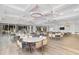 Large dining area with ample seating, modern lighting, and views of the outdoor area at 267 Garden Gate Way, Summerville, SC 29486