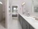 A spacious main bathroom with double sinks, modern fixtures, and a walk-in shower at 267 Garden Gate Way, Summerville, SC 29486