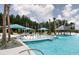 Resort-style pool area with lounge chairs, umbrellas, and a gazebo for relaxation and enjoyment at 267 Garden Gate Way, Summerville, SC 29486