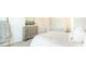 Bedroom featuring soft carpets, dresser, and view to bathroom at 267 Wild Strawberry Ln, Moncks Corner, SC 29461