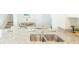 Well-appointed kitchen featuring granite countertops, a stainless steel sink, and a view into the dining area at 267 Wild Strawberry Ln, Moncks Corner, SC 29461