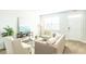Bright living room features lots of seating and neutral paint, creating a cozy atmosphere at 267 Wild Strawberry Ln, Moncks Corner, SC 29461
