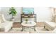 Cozy living room featuring stylish chairs, a decorative console table, and a comfortable sofa, perfect for relaxing at 267 Wild Strawberry Ln, Moncks Corner, SC 29461