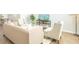 Inviting living room featuring a stylish sofa, comfortable chairs, and a tastefully decorated console table at 267 Wild Strawberry Ln, Moncks Corner, SC 29461