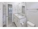 Modern bathroom featuring a double vanity and neutral walls at 277 W Smith St, Lincolnville, SC 29485