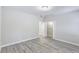 Bright bedroom features an open closet and neutral walls at 277 W Smith St, Lincolnville, SC 29485