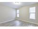 Well-lit bedroom showcasing modern windows and neutral walls at 277 W Smith St, Lincolnville, SC 29485